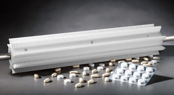 Pill dosing brush