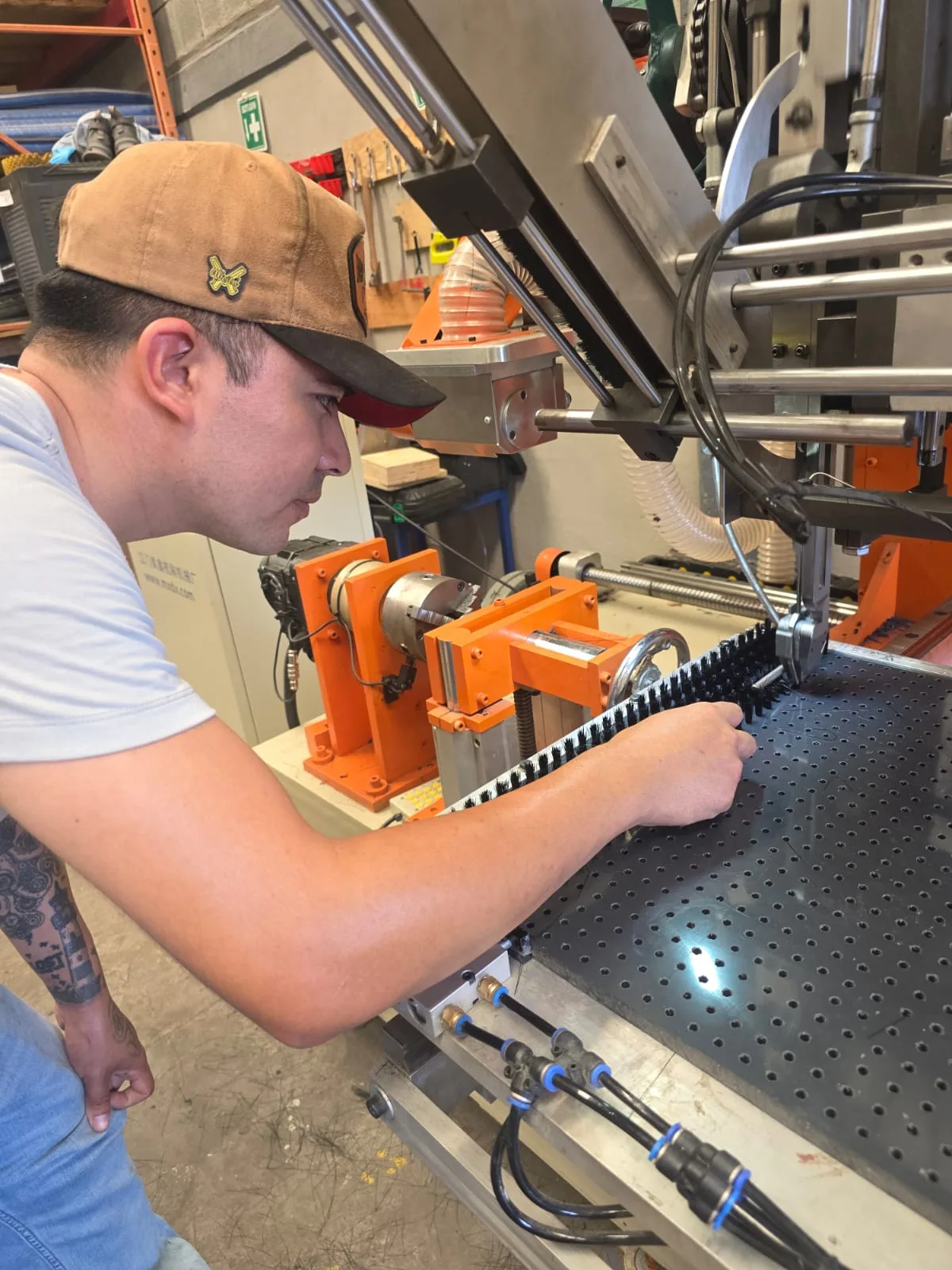 Technician manufacturing a custom industrial brush at Regios Brushes in Mexico