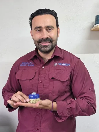 Mauricio Contreras, founder and general director of Regios Brushes, holding a custom brush component