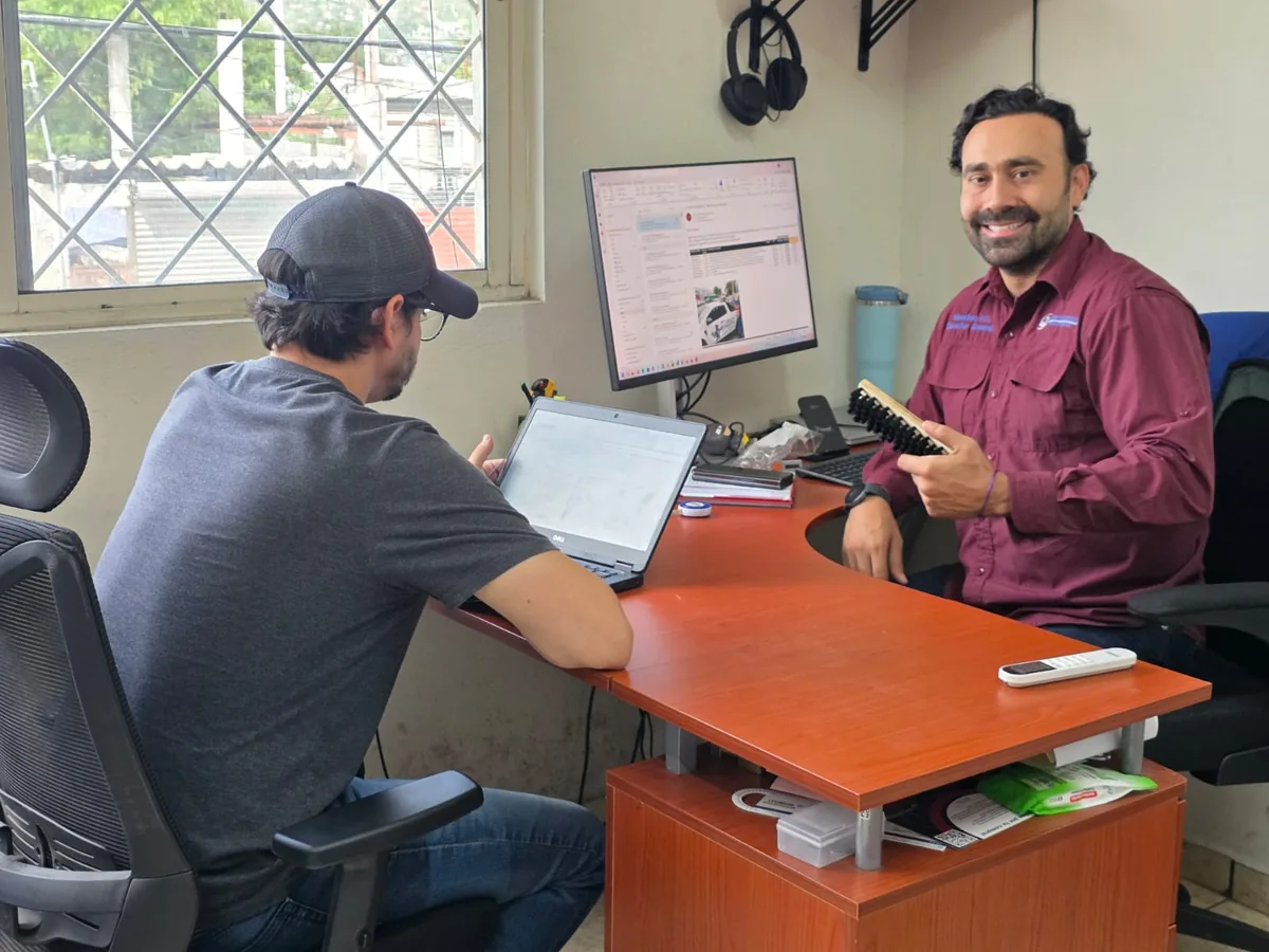 Mauricio Contreras reviewing a custom industrial brush application